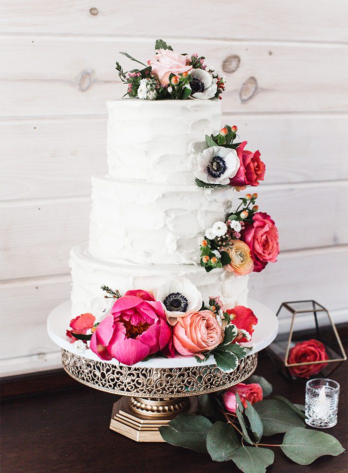 wedding cake with pink flowers