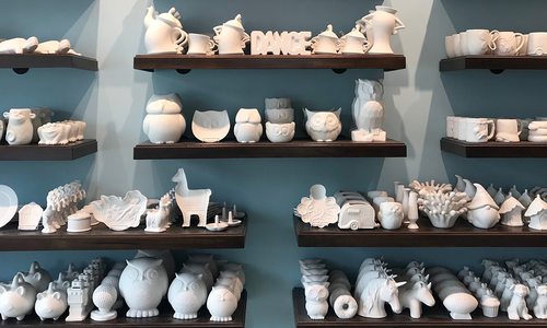 Wall of paint your own ceramics at Artistree Pottery in Springfield MO