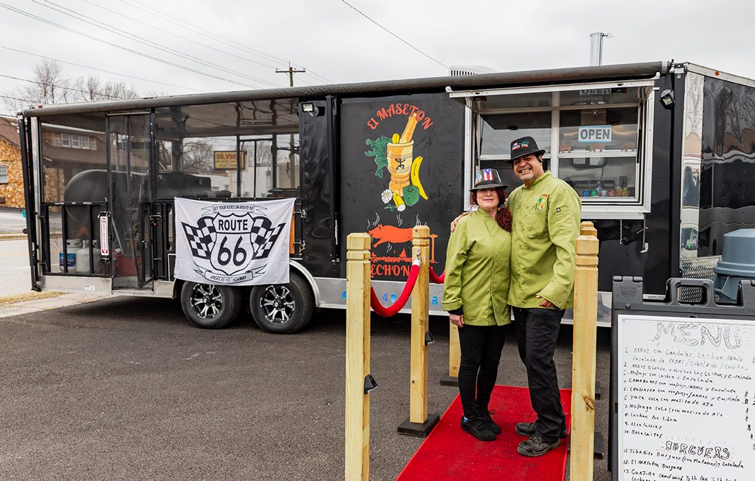 Couple in front of food truck