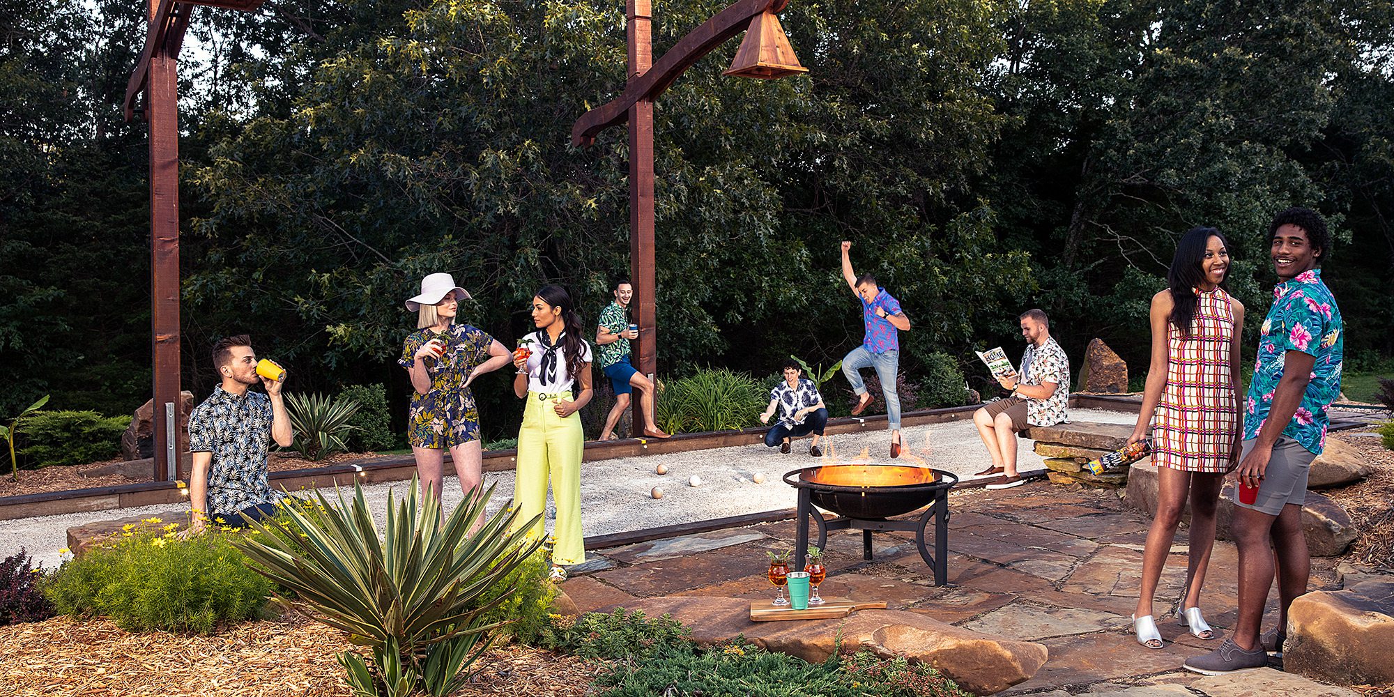 Backyard bocce game with a large group of friends