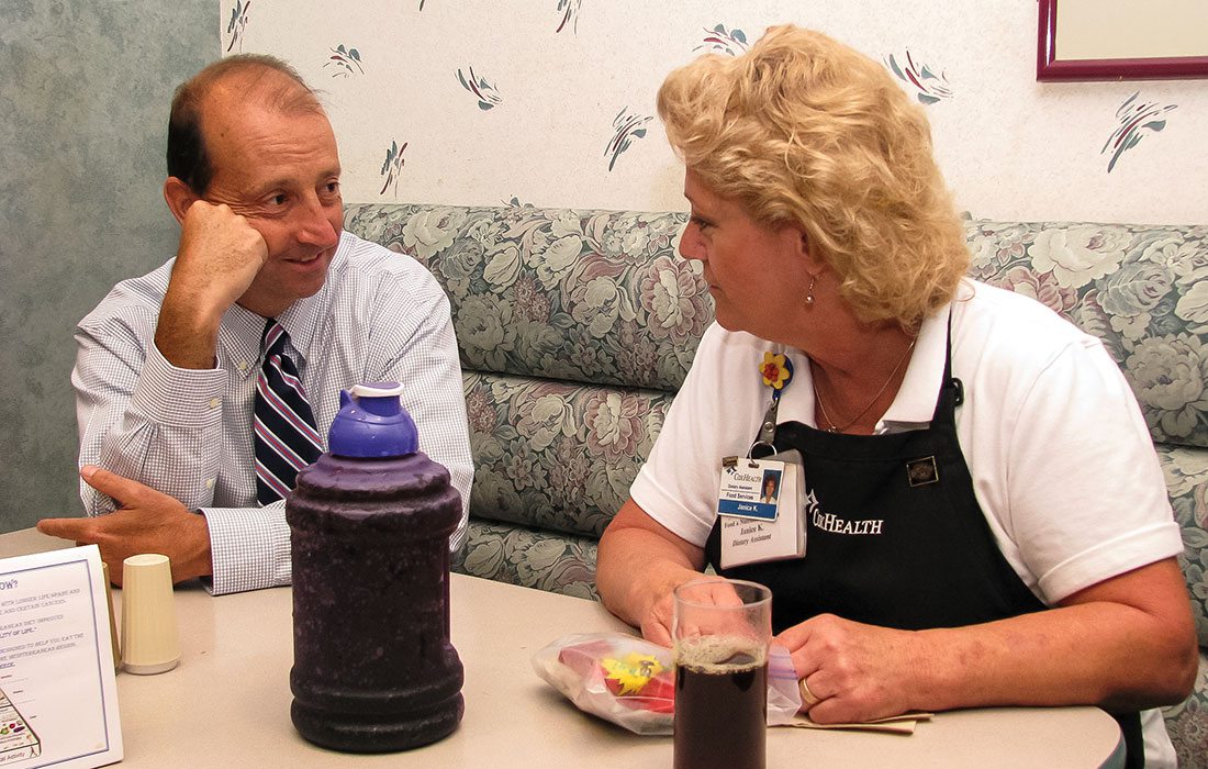 CoxHealth CEO Steve Edwards talking with hospital staff