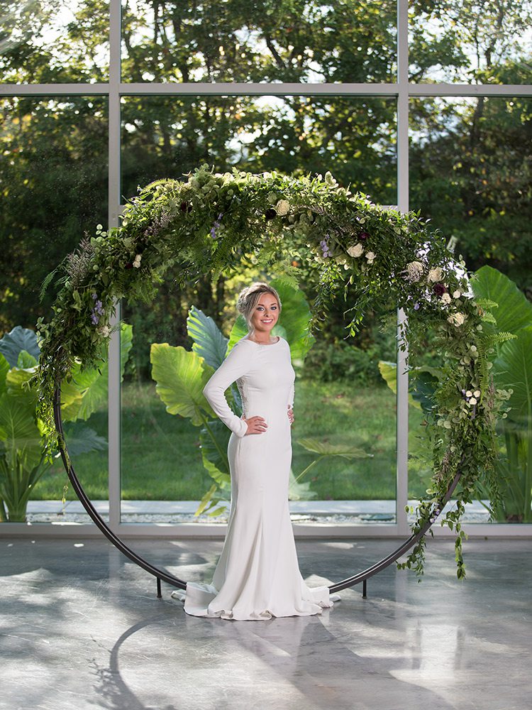 Justin Alexander long sleeved wedding dress at Normans Bridal Springfield MO