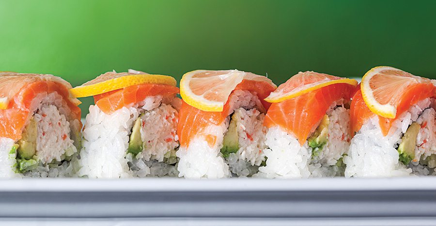 California sushi roll topped with lemon