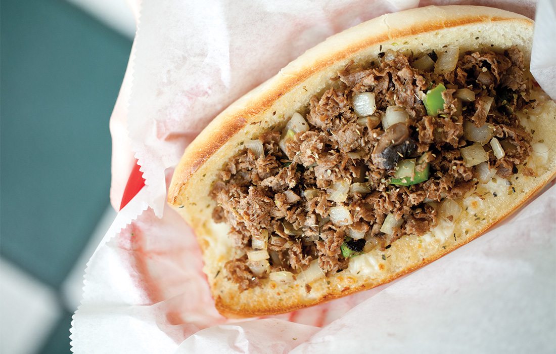 Philly cheesesteak sandwich on toasted bread at Chicago Cheesesteak Company in Springfield MO