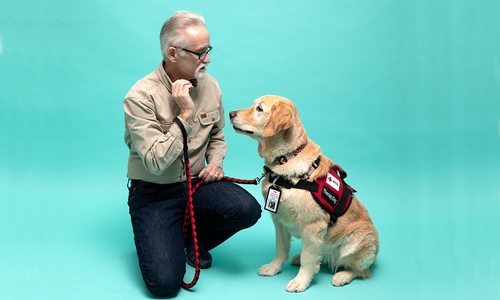 Walter Roberts and his therapy golden retriever Choppy