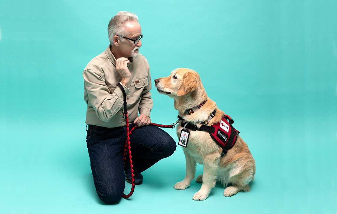 Walter Roberts and his therapy golden retriever Choppy