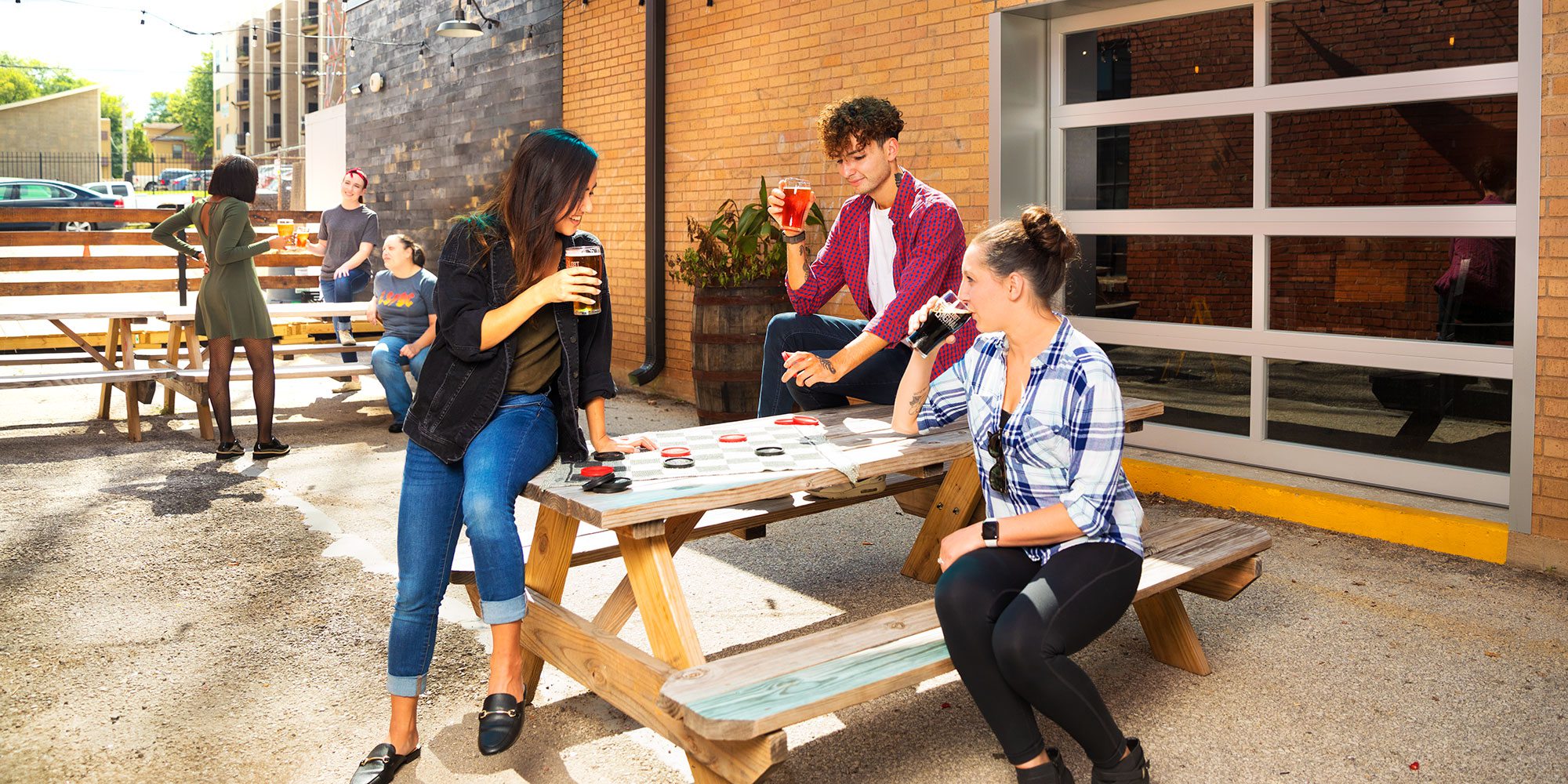 group of people playing a game on the patio at Lost Signal Brewery Springfield MO