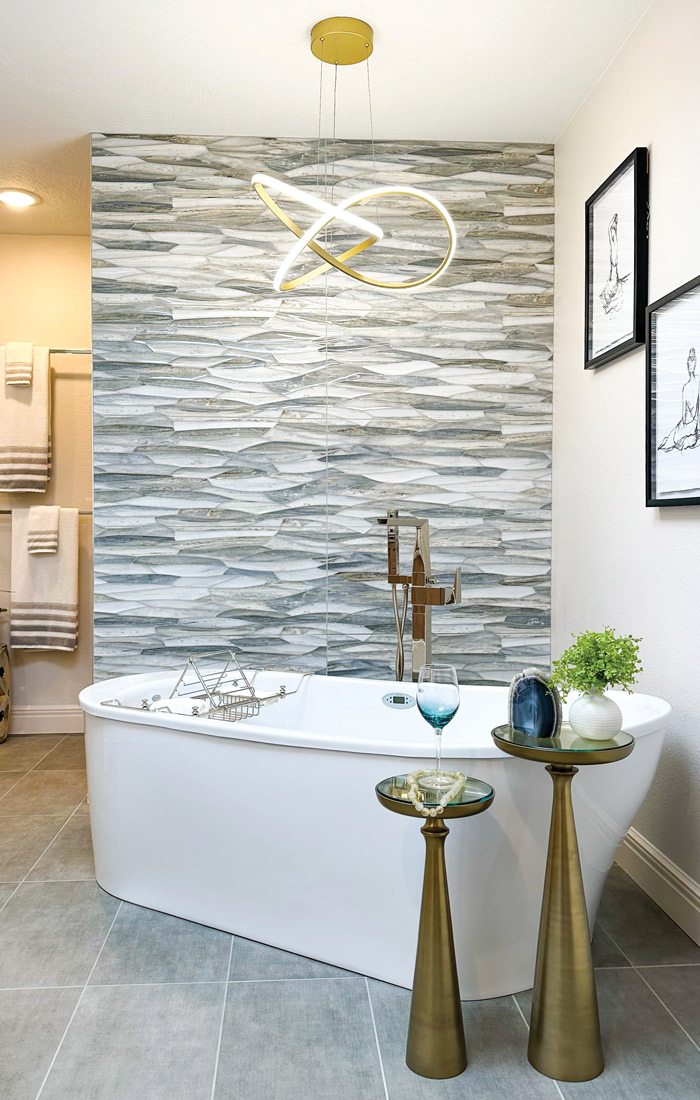 Bathtub with unique light fixture above