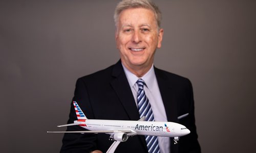 David Agee holding model American Airlines airplane