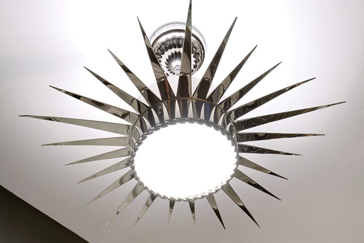 Silver sunburst chandelier.