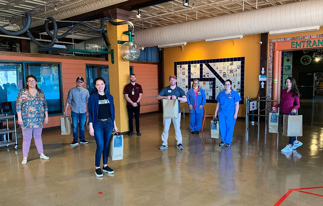 Discovery Center of Springfield staff members preparing to host temporary childcare