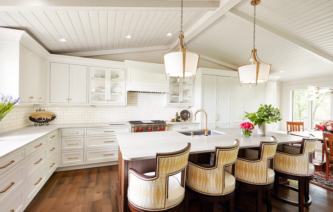 An open and inviting kitchen designed by Erica Lea Design Stuidos.