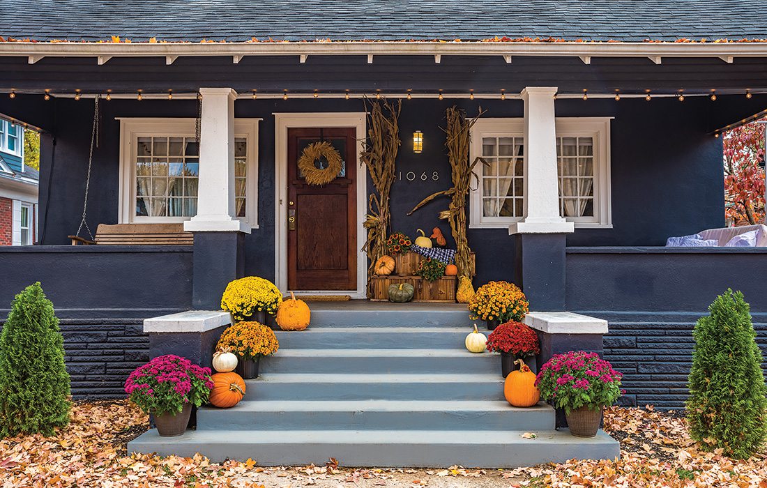 front porch decorated for fall