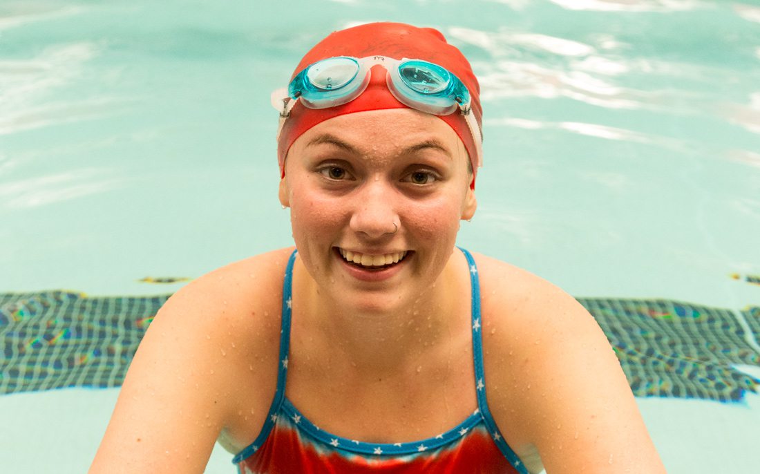 girl in swim cap and goggles