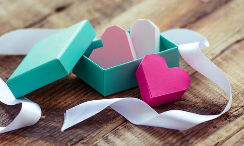 Paper hearts in a gift box