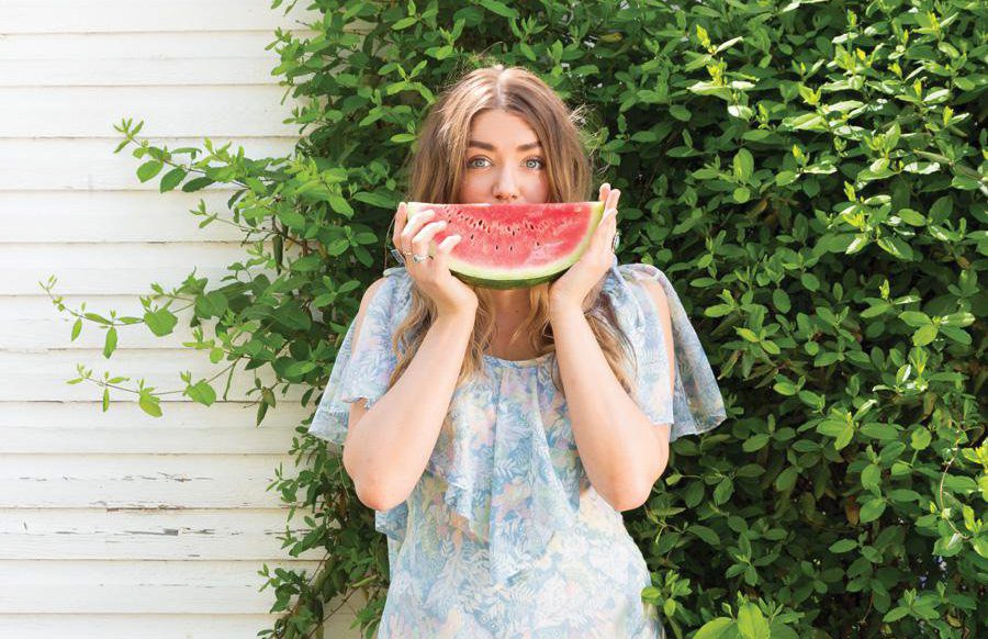 Girl holding watermelon