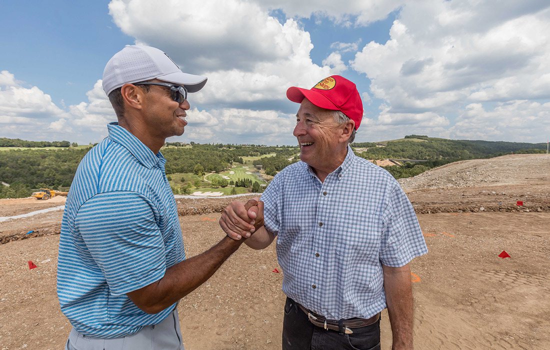 Tiger Woods and Johnny Morris