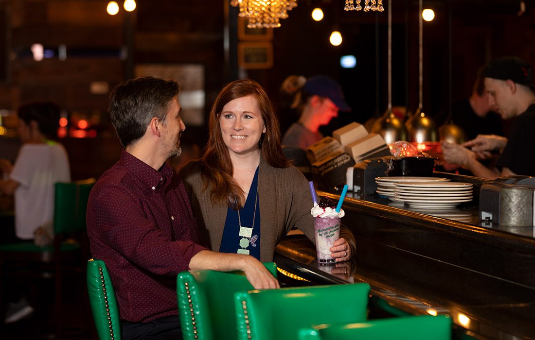 Couple sharing a milkshake at Black Sheep Burgers and Shakes in downtown Springfield MO