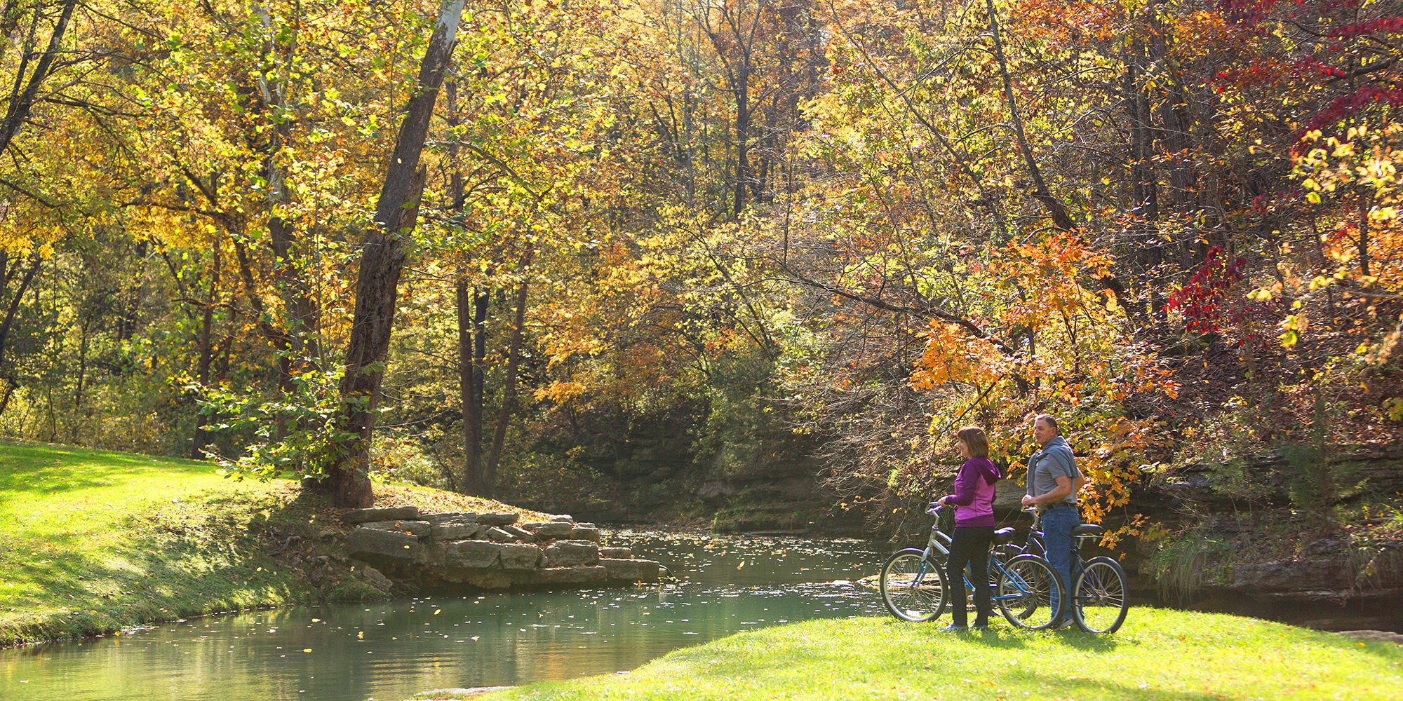 Couple biking at Dogwood Canyon