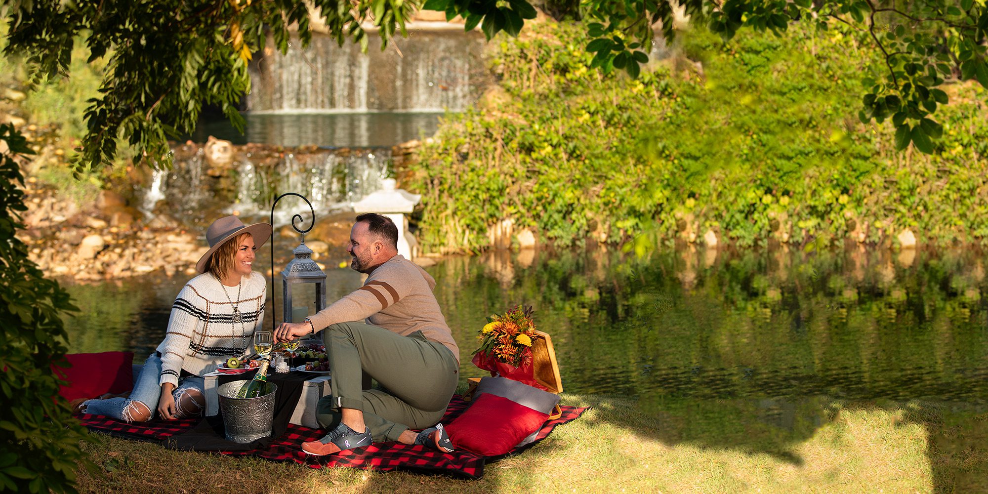 Couple on a picnic in the Mizumoto Japanese Stroll Garden in Springfield MO