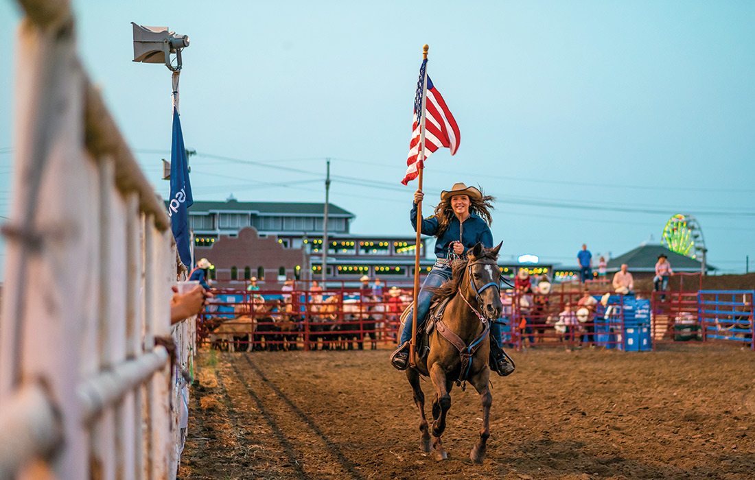 Horseback riding with flag