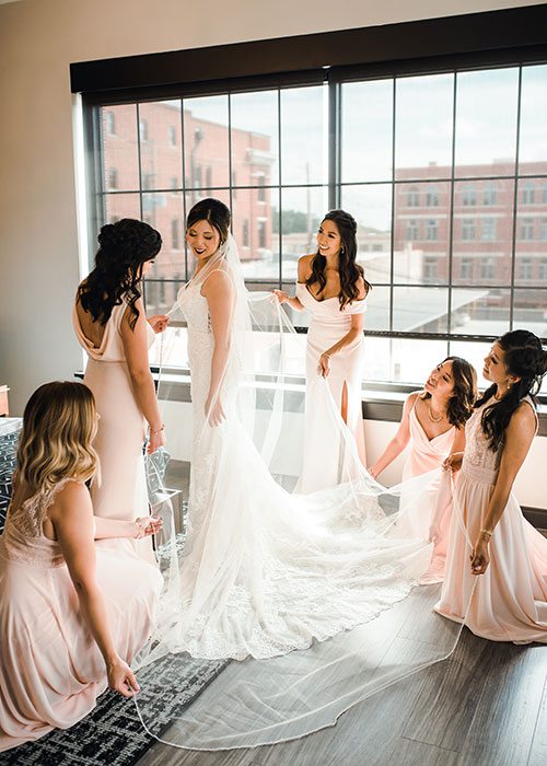 Bride with her wedding party at Hotel Vandivort in Springfield MO