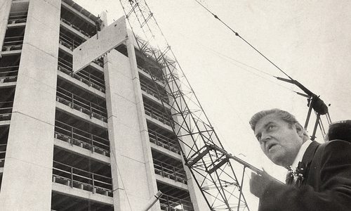 John Q. Hammons in front of the University Plaza construction site