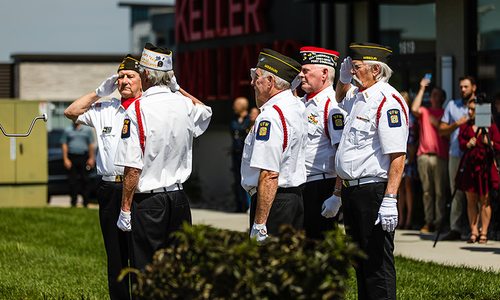 American flag ceremony outside Graddy Real Estate