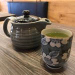 Slider Thumbnail: Green tea in pretty tea pot and glass