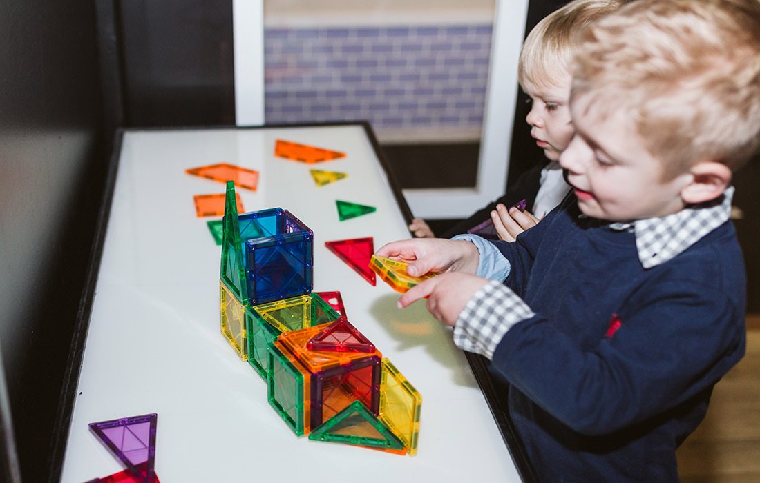 Young children playing and learning at Itty Bitty City in Springfield MO