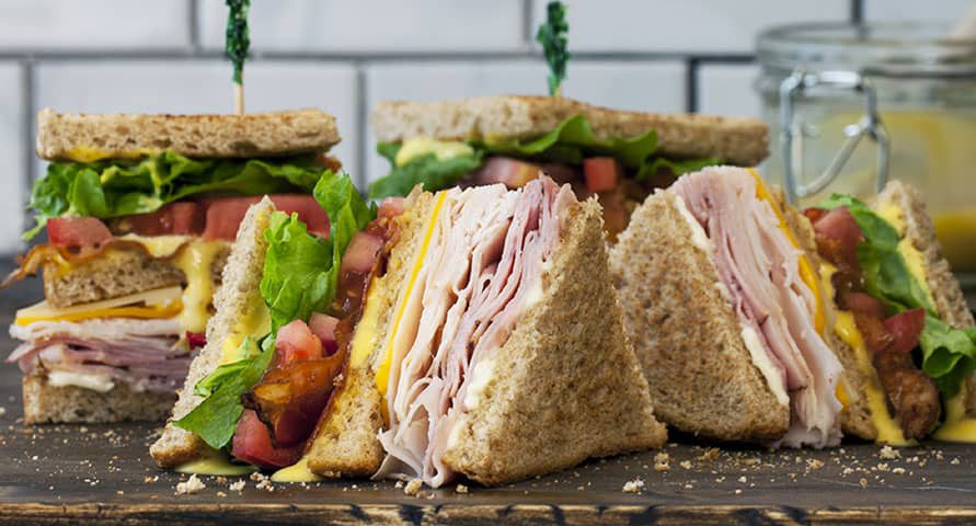 The sandwiches are piled high with meat, veggies or both with ingredients like turkey, bacon, cucumbers and avocado.