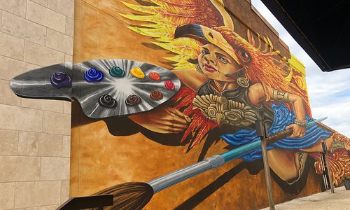 Athena mural located outside Fenix Fayetteville Art Gallery