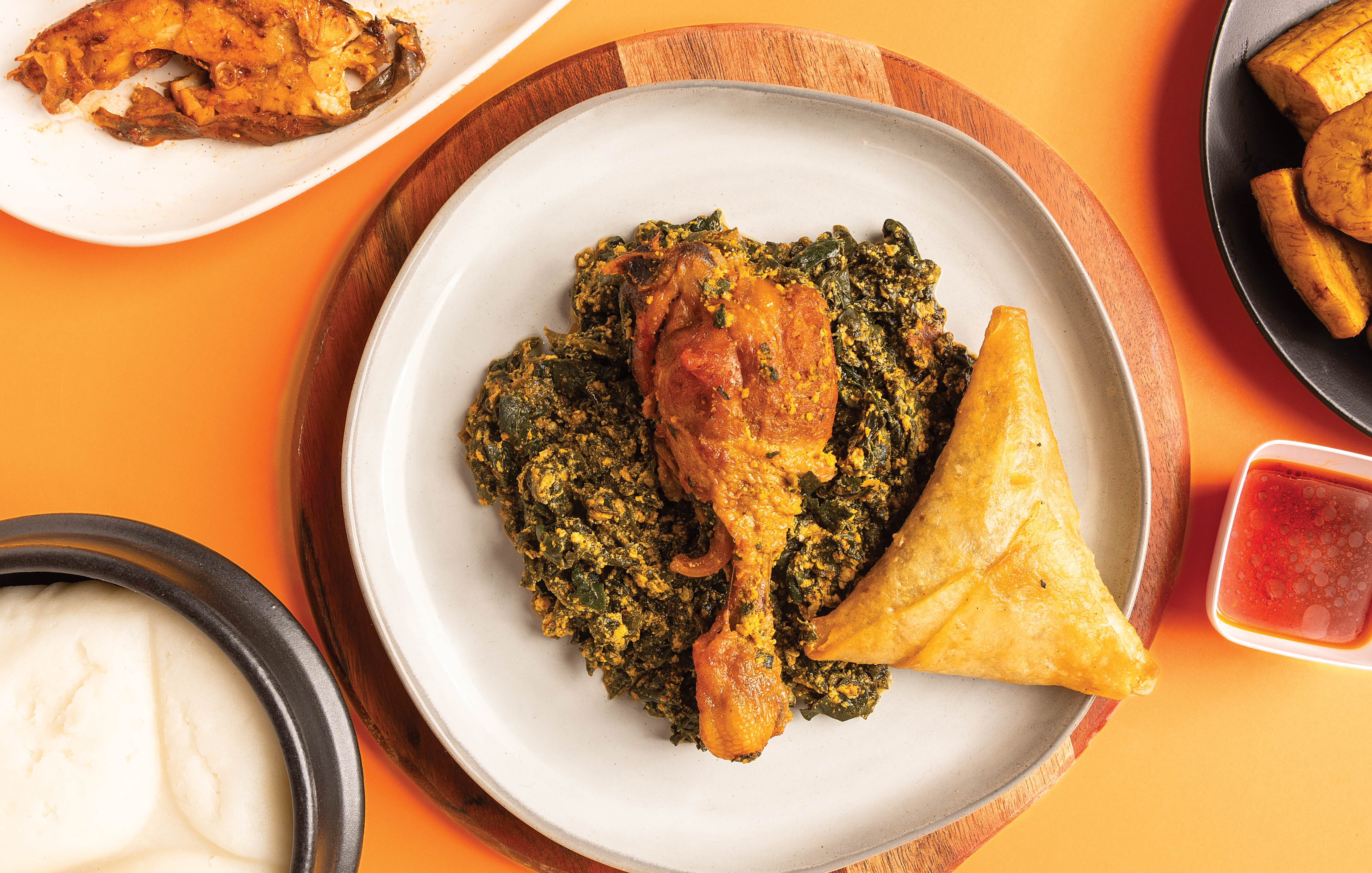 Ugali with chicken stew and sambusa from Nathalie African Food, Springfield