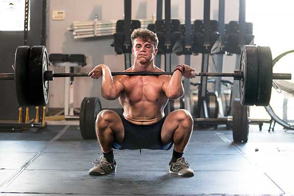 Look of effort and train is on Nathan's face as he lifts a large set