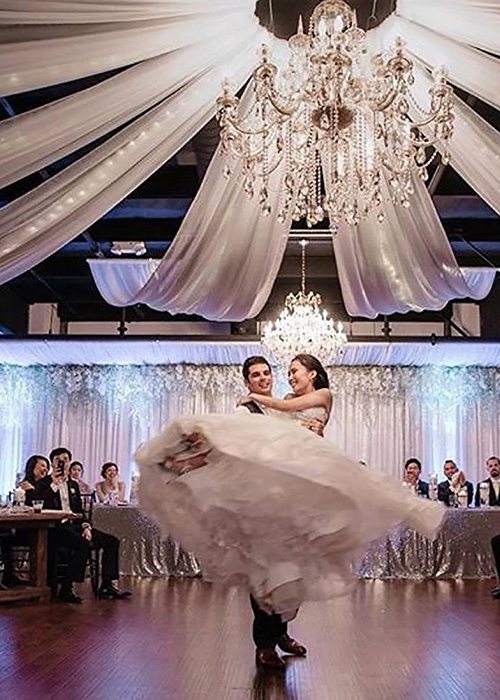 bride and groom dancing