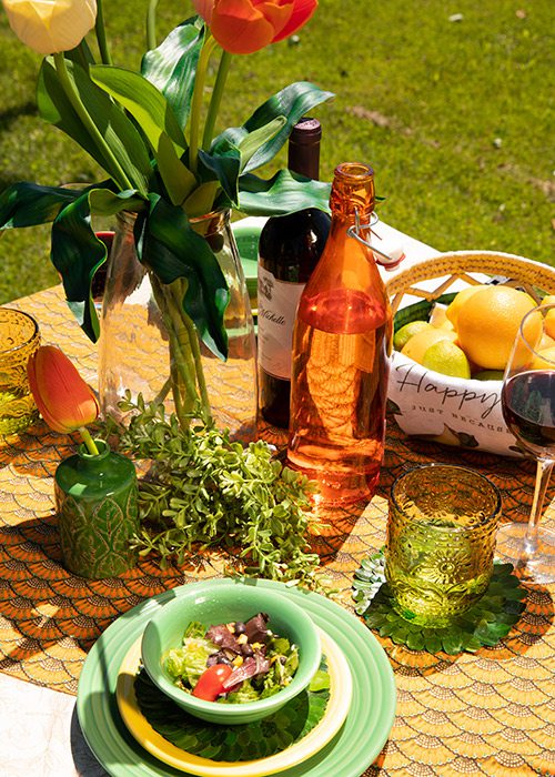 Bright orange and green table setting