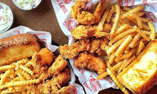 Chicken fingers baskets with coleslaw and fries from Raising Cane's