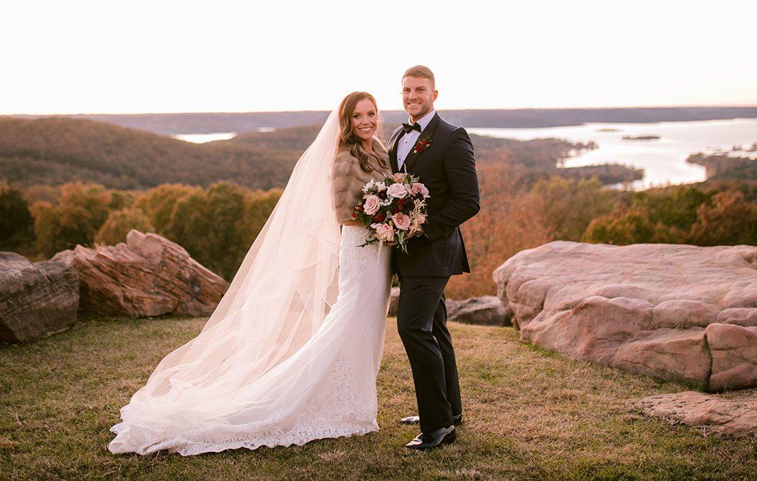 Makenzie Moore & Taylor Lambke on their wedding day at Top of the Rock in Branson, MO