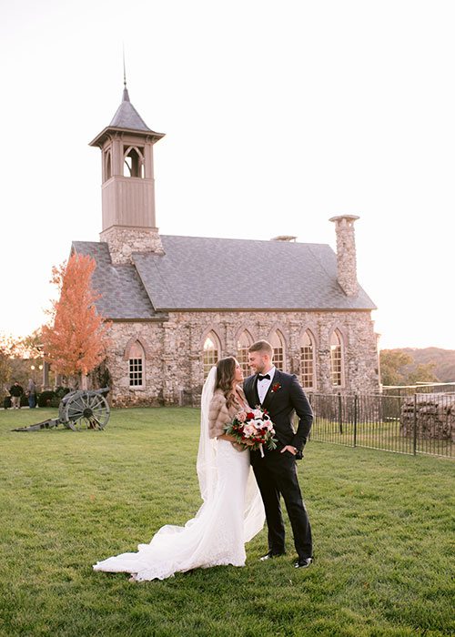 Makenzie Moore & Taylor Lambke on their wedding day at Top of the Rock in Branson, MO