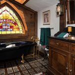 Slider Thumbnail: Rivercliff Estate Stained Glass Above Vintage Tub