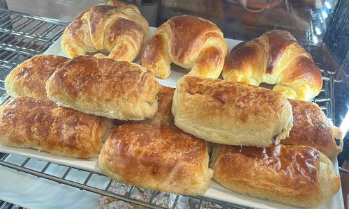 Pastries in a glass case.