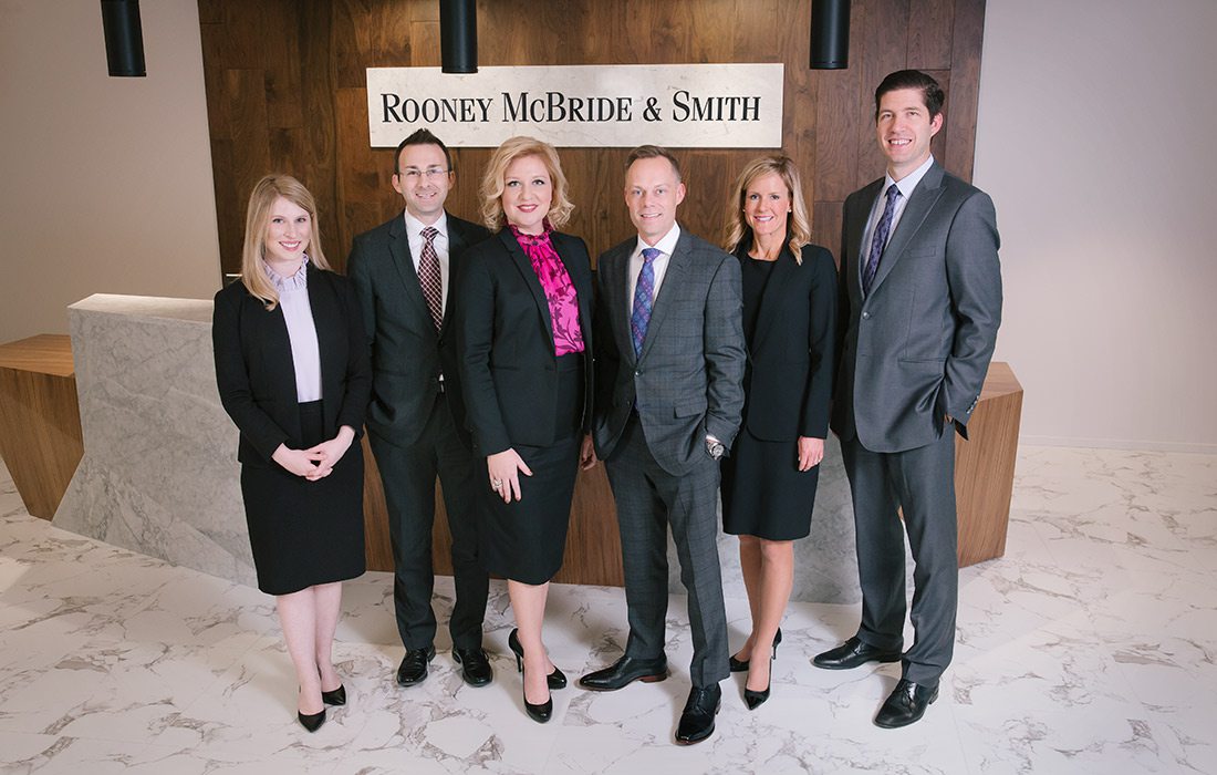 Mallory N. McDonald, Austine E. Williamson, Heather Rooney McBride, Scott A. Smith, Jennifer Brodersen and Andy Scholz of Rooney McBride & Smith in Springfield MO