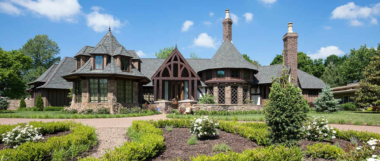 Tudor style Harry Potter home with beautiful landscaping.