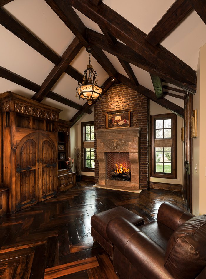 Tudor style office with Rumford fireplace and Cyprus floors.