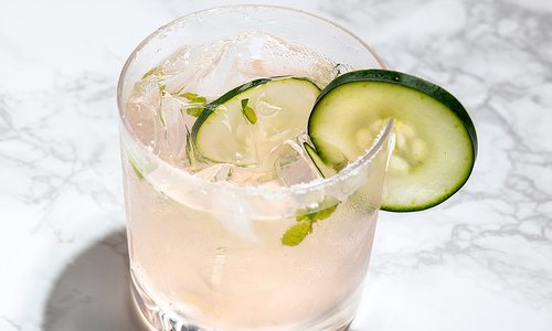 Salted Grapefruit Cooler on marble tabletop.
