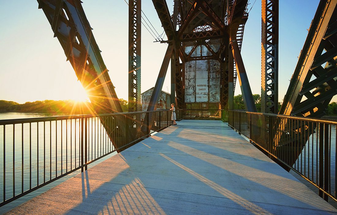 Take in the sights of the Missouri River from the Historic Katy Trail Railroad Bridge in Boonville, Missouri.