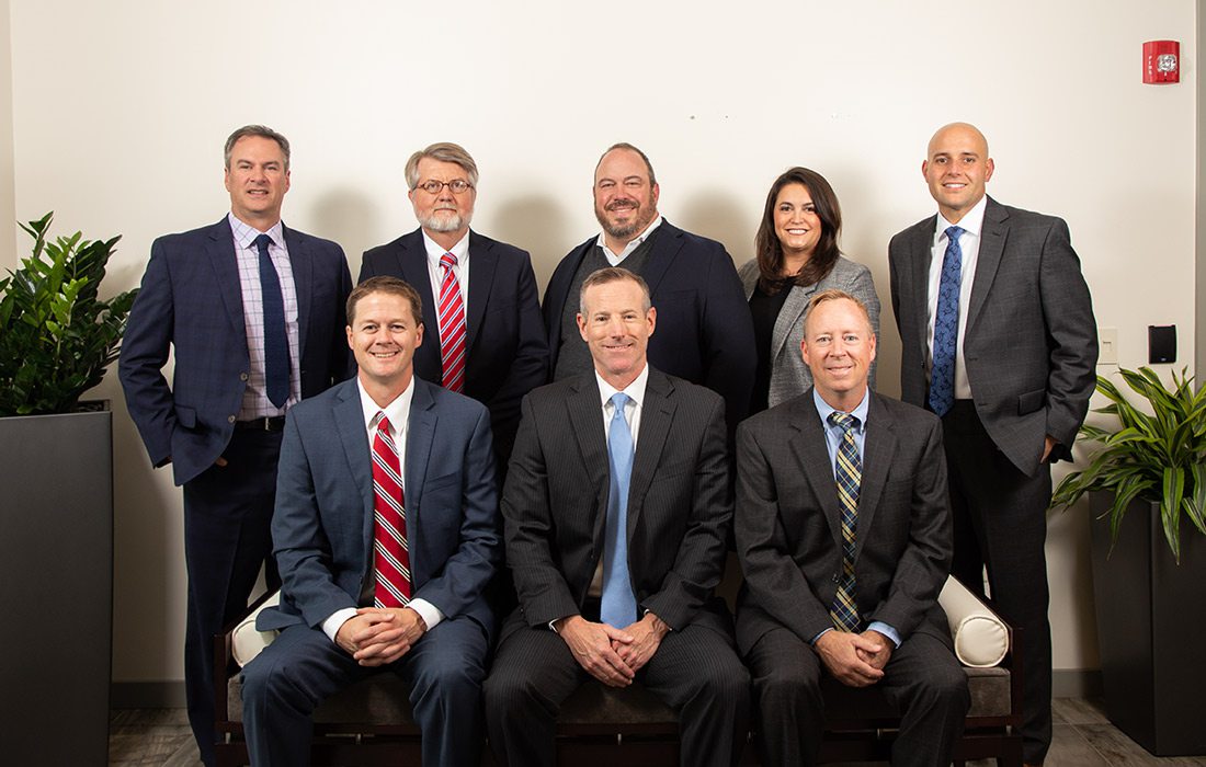 Front Row: Jason Smith, partner; Rod Nichols, partner; Mike Nichols, partner Back Row: Richard Walters, partner; Gary Powell, partner; Paul Satterwhite, partner; Elizabeth Wente, partner; Derek Ankrom, partner