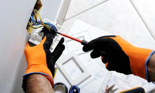 Electrician working in a home