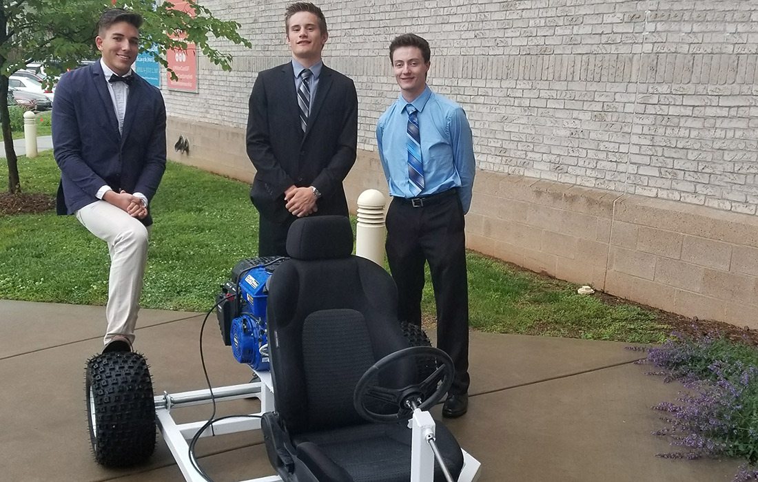 Joshua Bruce (right) and his friends designed and built a go-kart during their internship at SRC in Springfield MO