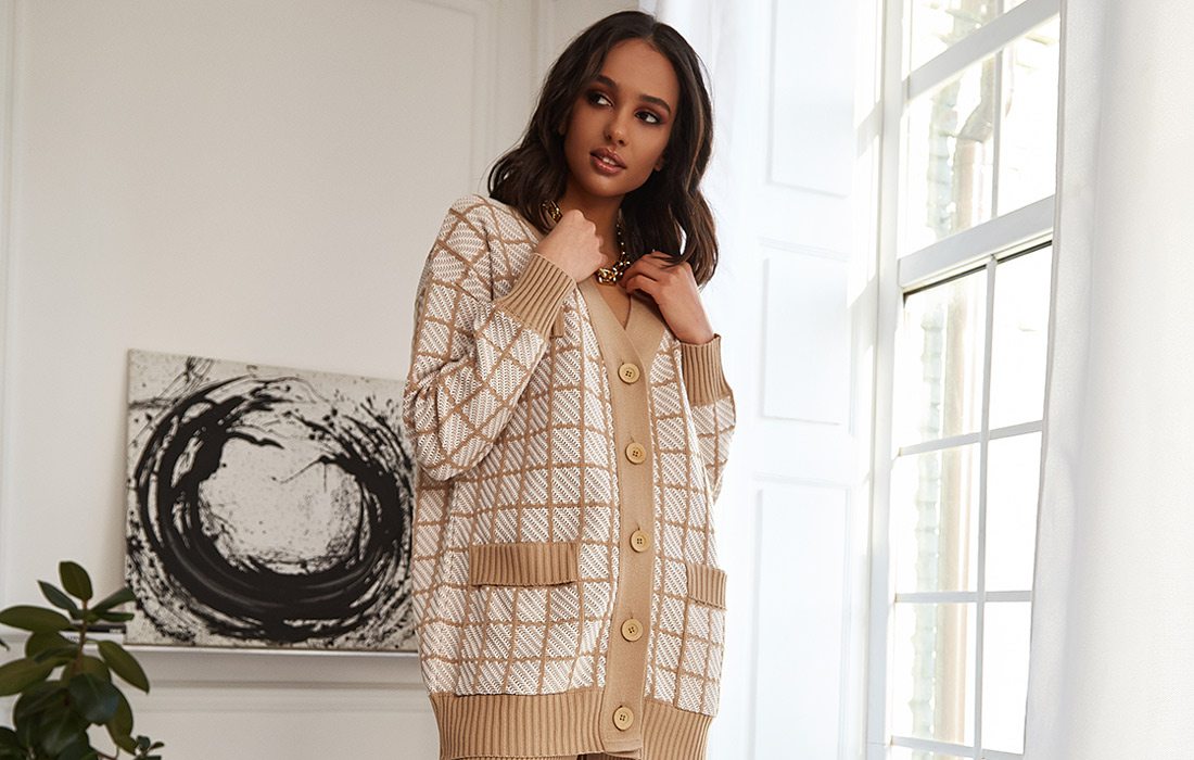 Woman in beige and white sweater